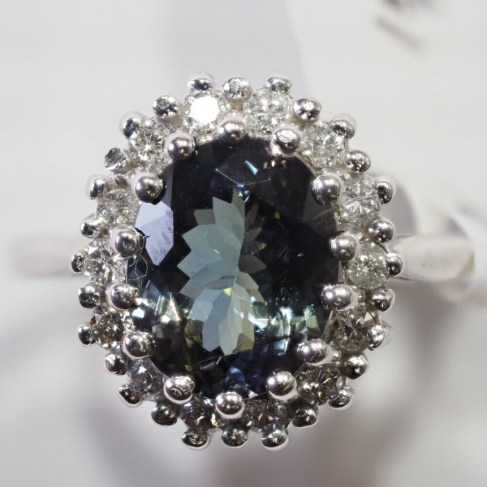 Silver Halo Blue Sapphire Ring with Diamond Accents